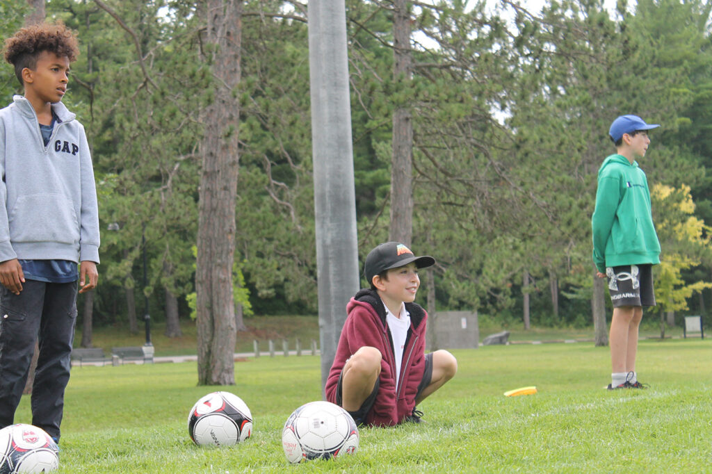 Aim for the line...who can get the ball closest.